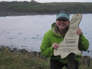 me with the sign, STOP go no further