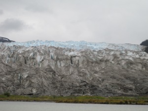 riding boat right in front of glacier